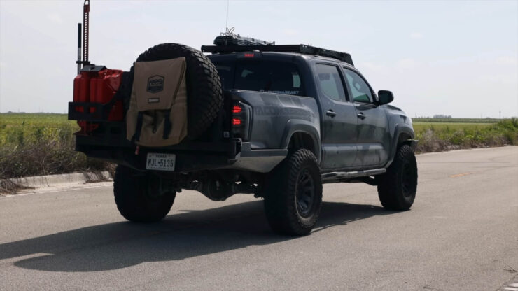 Toyota pickup truck braking on the road